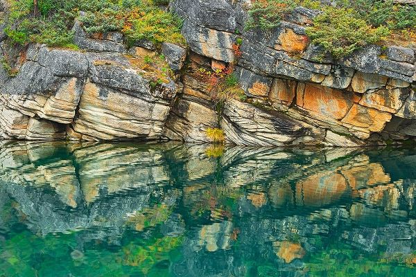 Canada-Alberta-Jasper National Park Reflection of rocks in Horseshoe Lake